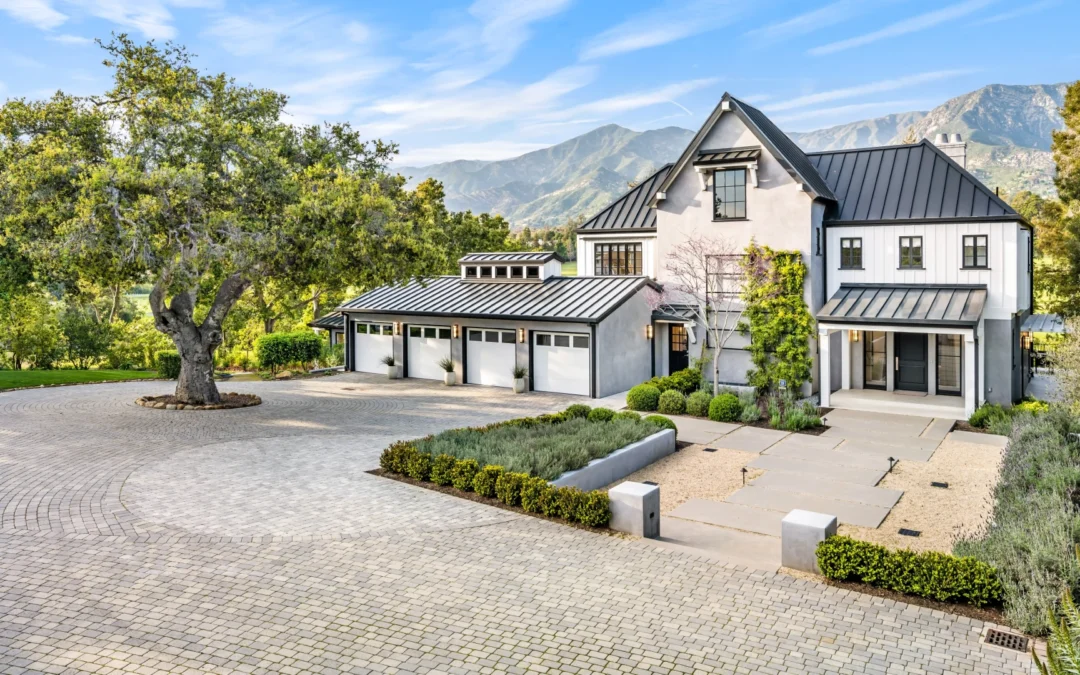 an-aerial-photo-shows-a-house-with-block-paving-driveway