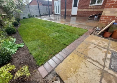 new-turf-edging-and-patio-for-residential-garden