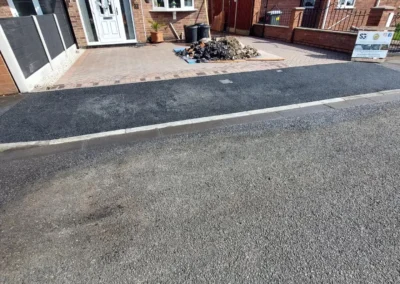 Full driveway paving including tarmac and block paving by SG Landscaping