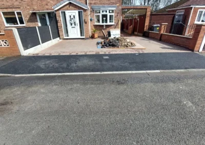 Full driveway paving including tarmac and block paving by SG Landscaping