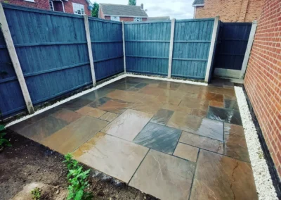 Garden tiling and wooden fencing job by SG Landscaping