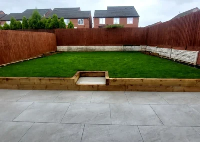 wood-garden-bed-with-gray-tiles