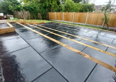 slopped-garden-path-way-with-black-tiles