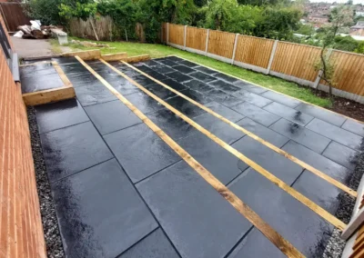 slopped-garden-path-way-with-black-tiles