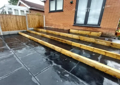 slopped-garden-path-way-with-black-tiles